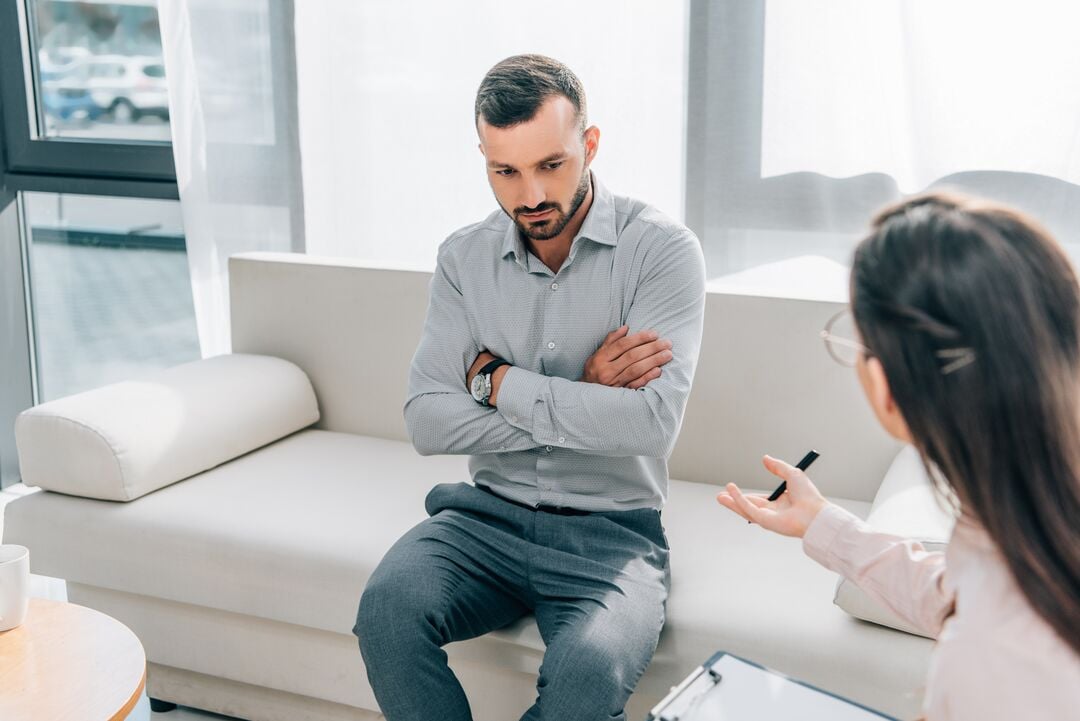 Medium-psychologist-and-patient-talking-in-clinic-mental-2021-08-29-22-52-02-utc